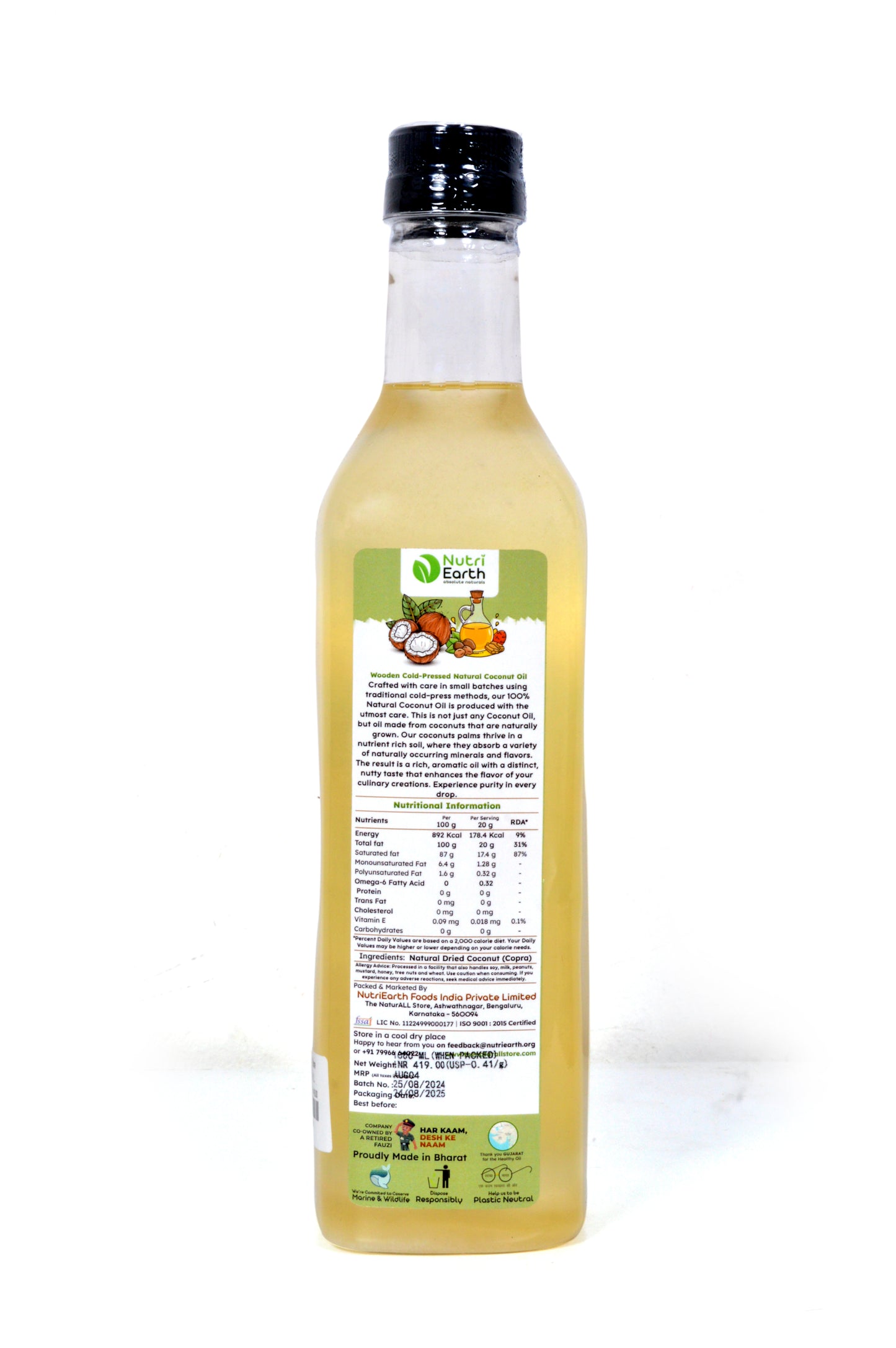 Nutriearth Wooden Cold Pressed Coconut Oil
in bottle with black lid, showing its nutritional facts. Premium wooden cold pressed oil buy online.