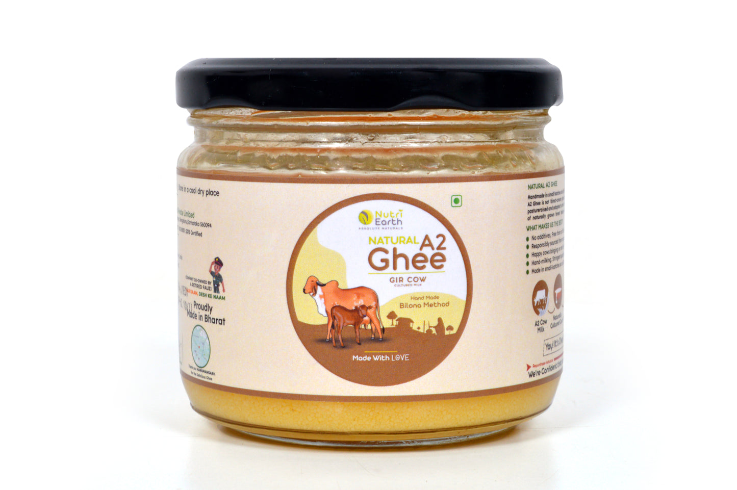 
Nutriearth A2 Cow Ghee Gir in a glass jar with black lid, showcasing premium dairy product made from Gir cow milk. Buy A2 cow ghee online at The NaturALL Store.