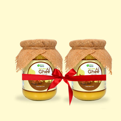 Nutriearth A2 Cow Ghee Gir  in glass jars with jute covers, bundled with a red ribbon. Premium dairy product from Gir cow milk.